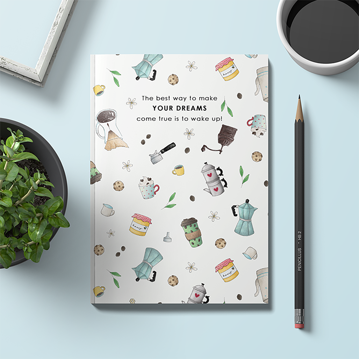 Quaderno con pattern sul caffè con la scritta The best way to make your dreams come true is wake up