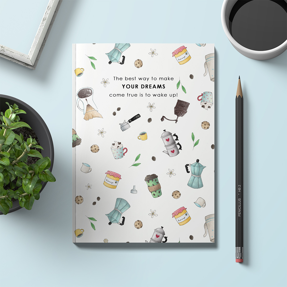 Quaderno con pattern sul tema caffè con la frase "The better way to make your dreams come true is to wake up"